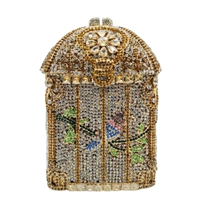 Detailed view of luxury birdcage clutch with floral rhinestone patterns and metal lock