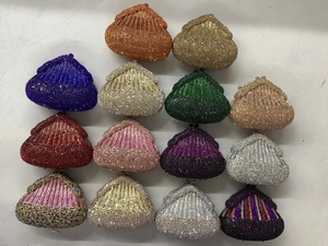 Detailed collection of shell-shaped rhinestone evening clutches in various luxury colors
