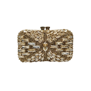 Detailed close-up of golden metal rhinestone clutch bag with radial crystal pattern