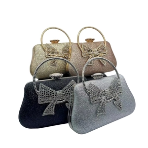 Bow-knot evening clutch bags in gold, rose gold, black, and silver with glitter finish