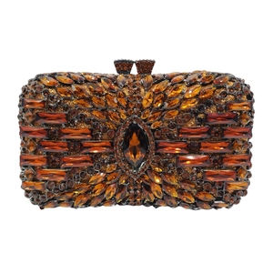Luxury rhinestone evening clutch bag with amber crystals and gold hollow metal frame