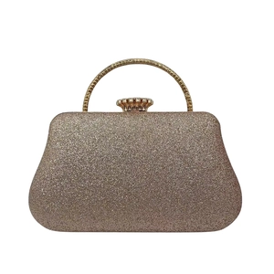 Elegant champagne gold glitter evening clutch bag with metal handle and crown clasp