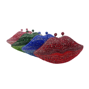Lip-shaped clutch bags with sparkling rhinestones in red, blue, green, and pink