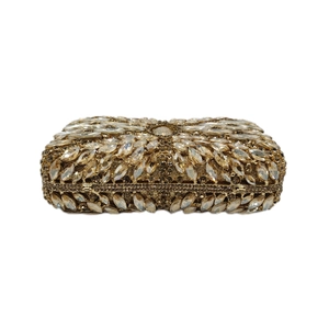 Detail of champagne gold rhinestone clutch bag showing intricate floral crystal patterns