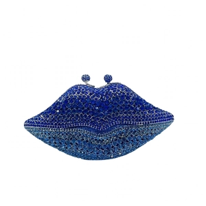 Macro view of crystal encrusted lip clutch with blue and light blue rhinestone detail