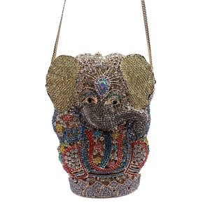 Detailed view of handmade colorful crystals and diamonds on the elephant evening clutch bag