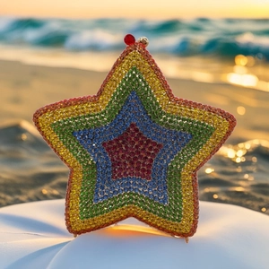 Star-shaped rhinestone evening clutch with vibrant rainbow gradient and metallic clasp