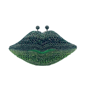 Green lip shaped evening clutch bag fully covered in sparkling crystals and rhinestones