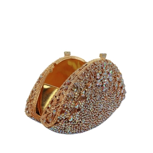 Luxury gold evening clutch bag with wisteria floral rhinestone inlay and metal lining