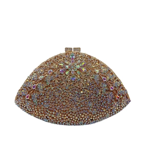 Detailed close-up of crystal floral clusters on a luxury rhinestone evening clutch bag