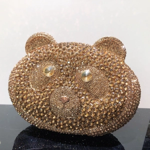 Luxury champagne gold bear shaped evening clutch bag fully encrusted with sparkling crystals
