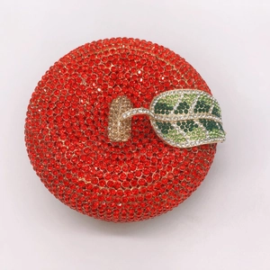 Luxury red apple shaped evening clutch bag with crystal rhinestones and gold leaf detail