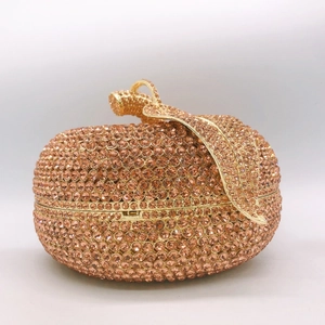 Champagne gold apple shaped evening clutch bag fully encrusted with sparkling rhinestones