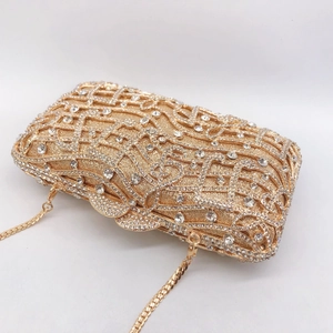 Elegant gold music note evening clutch bag with hollow out rhinestones and chain strap