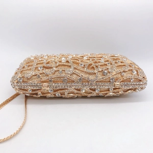 Golden musical note evening clutch bag with sparkling rhinestones and metal chain strap