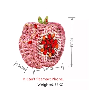 Detail showing apple-shaped clutch bag dimensions 16x14x5.5cm with pink gradient rhinestones