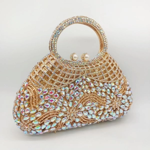 Luxurious gold evening clutch bag with sparkling rhinestones and crystal handle