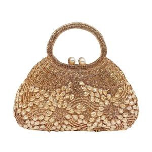 Luxury gold evening clutch bag with sparkling rhinestones and elegant pearl clasp