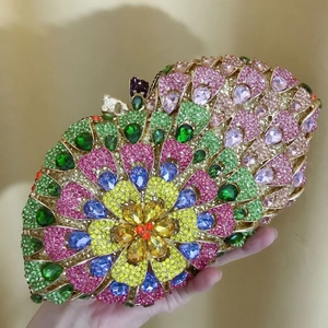 Detailed macro of a luxury evening clutch with colorful floral rhinestone patterns