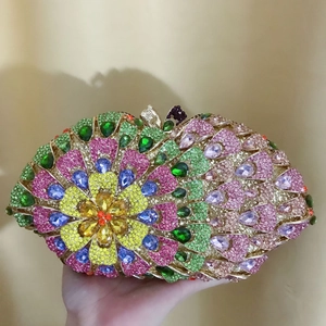 Luxurious evening clutch bag with colorful rhinestones and floral peacock design