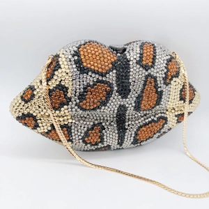 Lip-shaped evening clutch bag with leopard print rhinestones and golden chain strap