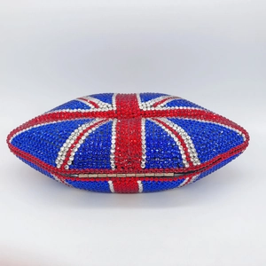 Detail of rugby-shaped clutch bag with Union Jack rhinestone patterns and metal clasp
