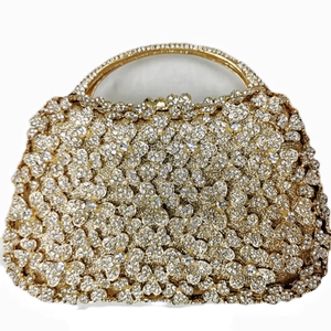 Luxurious gold oval evening clutch bag with white rhinestone flower patterns and top handle
