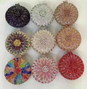 Detailed grid view of nine round rhinestone clutch bags in various luxury colors and patterns