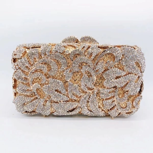 Detailed view of luxury hollow floral crystal evening clutch bag with gold frame