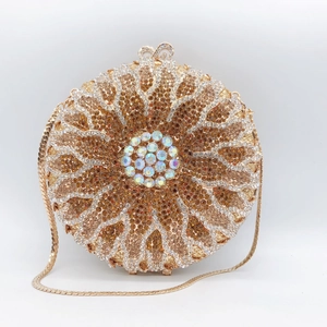 Luxurious round sunburst rhinestone clutch bag with gold chain and floral crystal pattern
