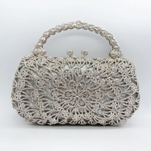 Sparkling crystal evening clutch bag with floral rhinestone pattern and top handle