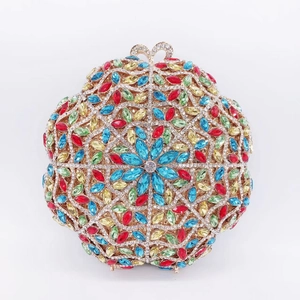 Detailed front view of round evening clutch with colorful marquise rhinestones and gold frame