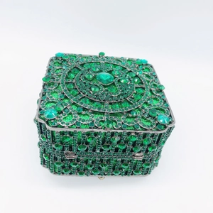 Elegant emerald green crystal clutch bag with silver metal frame for formal dinner party