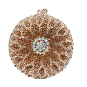 Luxurious round sunburst clutch bag with gradient rhinestones and metallic ring clasp