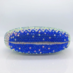 Deep blue rhinestone evening clutch bag with iridescent crystal accents and silver frame