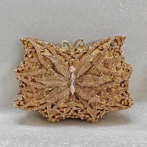 Elegant rose gold butterfly evening clutch bag with sparkling pink rhinestones