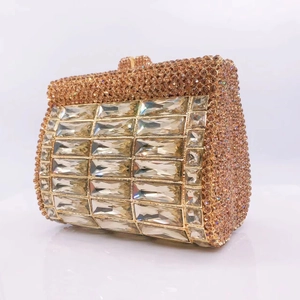 Macro detail of luxury champagne gold rhinestone evening clutch with rectangular crystals
