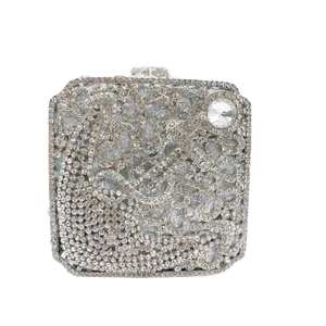 Silver crystal evening clutch bag with sparkling rhinestone diamond pattern and chain
