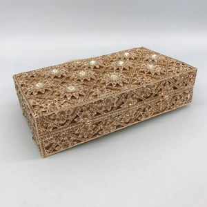 Champagne gold evening clutch bag with geometric hollow patterns and sunflower crystals