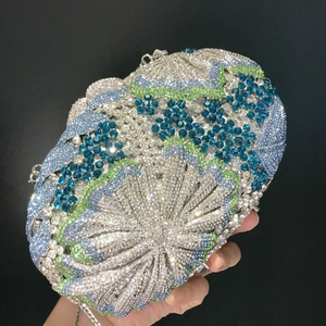Hollow flower evening clutch with luxury rhinestones in blue and silver gradients