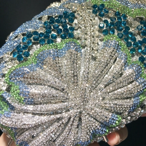 Exquisite floral rhinestone clutch with royal blue and teal crystals for evening parties