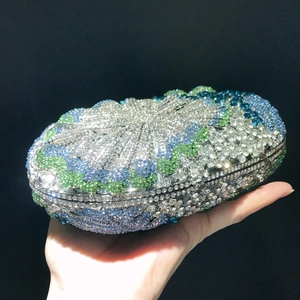 Detail view of mini hollow floral evening clutch with colorful sparkling rhinestones