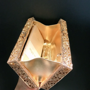 Golden sunflower evening clutch bag with sparkling rhinestones and chain strap detail
