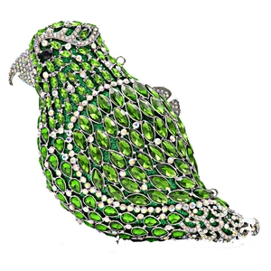 Detailed view of parrot evening clutch bag with green marquise gems and crystals