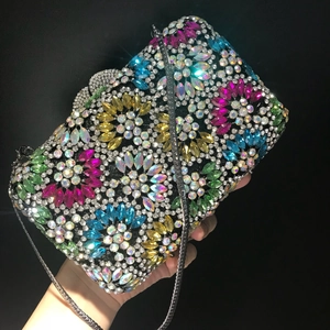 Sparkling crystal floral evening clutch with rainbow rhinestones and silver chain strap