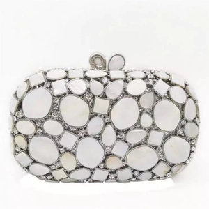 Elegant shell-shaped dinner clutch bag with mother of pearl tiles and butterfly clasp