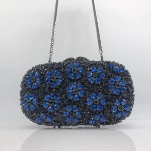 Luxury floral crystal evening bag with blue and black rhinestones and chain strap