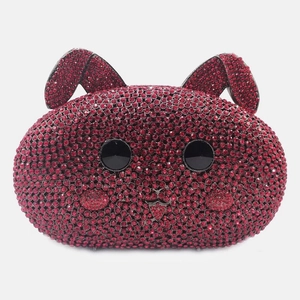 Close-up of red rhinestone rabbit evening bag with intricate crystal detailing
