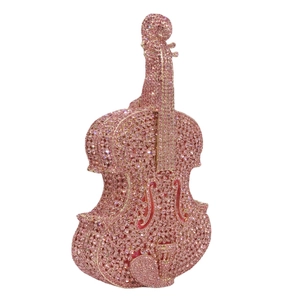 Pink violin shaped clutch bag fully encrusted with sparkling rhinestones and crystals