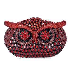 Detailed view of red and black rhinestone owl clutch with intricate crystal craftsmanship